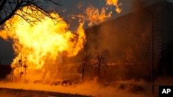Fire and smoke rises after a Russian attack in Kyiv, Ukraine, Jan. 2, 2024. 