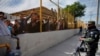 Frustration Grows as Migrant Caravan Stuck in Mexico Shelter