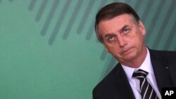 Brazil's President Jair Bolsonaro holds a ceremony to present his cabinet members at the presidential palace in Brasilia, Jan. 2, 2019.