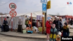 EN FOTOS | Refugiados llegan a la frontera con Eslovaquia huyendo de la crisis