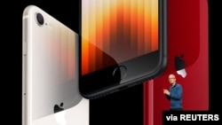 Apple CEO Tim Cook introduces the new iPhone SE featuring 5G and the A15 Bionic chip during a special event at Apple Park in Cupertino, California, on March 8, 2022. (Brooks Kraft/Apple Inc./Handout via REUTERS) 