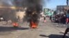 Flaming tires burn on a main road in Petionville, a suburb of Haiti’s capital, Port au Prince, Sept. 16, 2019. (M. Vilme/VOA Creole) 