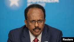 FILE - Somali President Mohamed Abdullahi Farmajo attends the London Somalia Conference' at Lancaster House, May 11, 2017. 