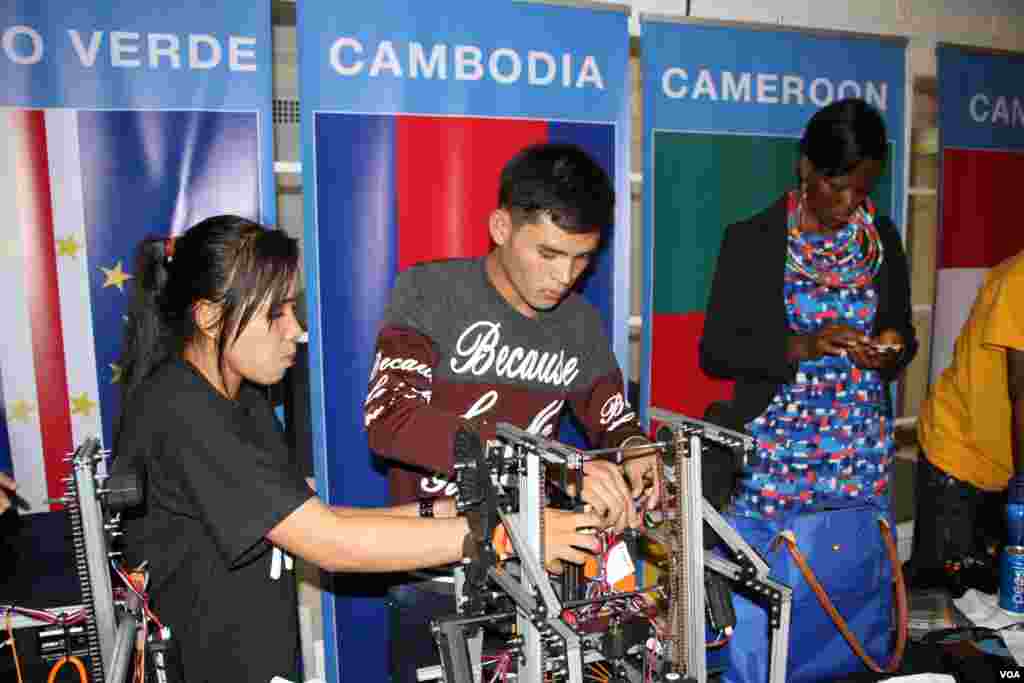Cambodian youth robotics team examine their robot before joining their first competition at the First Global Challenge in Washington, DC, Monday, July 17, 2017. (Sophat Soeung/VOA Khmer)