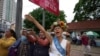 Cambodian Dissident Dresses up as 'Lady Justice' for Trial