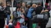 Civilians evacuate in Soledar, Donetsk region, Ukraine, May 24, 2022.