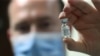 A pharmacist displays an ampoule of dexamethasone at the Erasme Hospital amid the coronavirus disease (COVID-19) outbreak, in Brussels, Belgium, June 16, 2020.