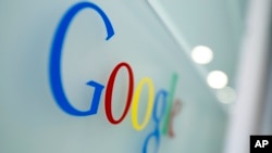 FILE - Google logo is seen at the Google headquarters in Brussels, March 23, 2010.