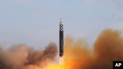 FILE - The North Korean government shows the test-firing of a missile at Pyongyang International Airport in Pyongyang, North Korea, Nov. 18, 2022. Photo released Nov. 19, 2022.