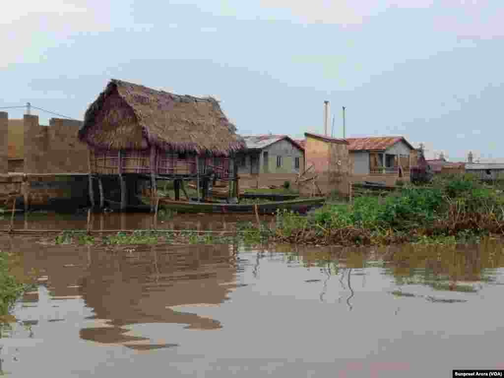 A remote village where tracking a child’s health care records can be a challenge, as paper records can be lost or are incomplete, Benin, Africa. (Sunpreet Arora)