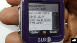 This May 8, 2016 photo by Asst. Prof. Pakarat Jumpanoi shows a smartwatch used by students caught cheating in exams for admission to medical and dental faculties in Bangkok.