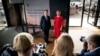 Former NATO chief Anders Fogh Rasmussen poses with Slovak President Zuzana Caputova as she arrives for the Copenhagen Democracy Summit, in Copenhagen, Denmark, May 10, 2021. 
