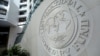 FILE - The International Monetary Fund logo is seen at its headquarters in Washington, Oct. 9, 2016. 