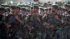 FILE - Members of Iran's Revolutionary Guards march during a military parade to commemorate the 1980-88 Iran-Iraq war in Tehran Sept. 22, 2007.