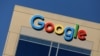 The Google logo is pictured atop an office building in Irvine, California, Aug. 7, 2017.