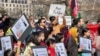 FILE - People demonstrate in front of the White House in Washington, January 1, 2023, against the Afghan Taliban regime's ban on higher education for women.