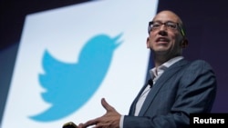 FILE - Twitter CEO Dick Costolo gestures during a conference at the Cannes Lions in Cannes, France, June 20, 2012. 