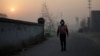 Artist Liu Bolin Live Streams Beijing Smog to Raise Awareness