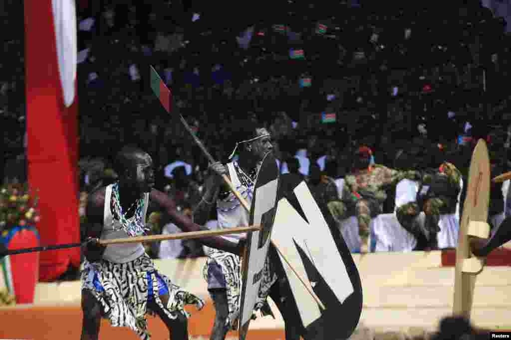 Actors perform a play during celebrations marking the third anniversary of South Sudan's independence in Juba, July 9, 2014.