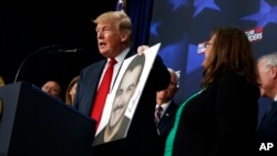President Donald Trump speaks about immigration alongside family members affected by crime committed by undocumented immigrants, at the South Court Auditorium in the White House complex, June 22, 2018, in Washington.