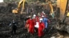 24 dead in Uganda landfill collapse as rescuers find more victims