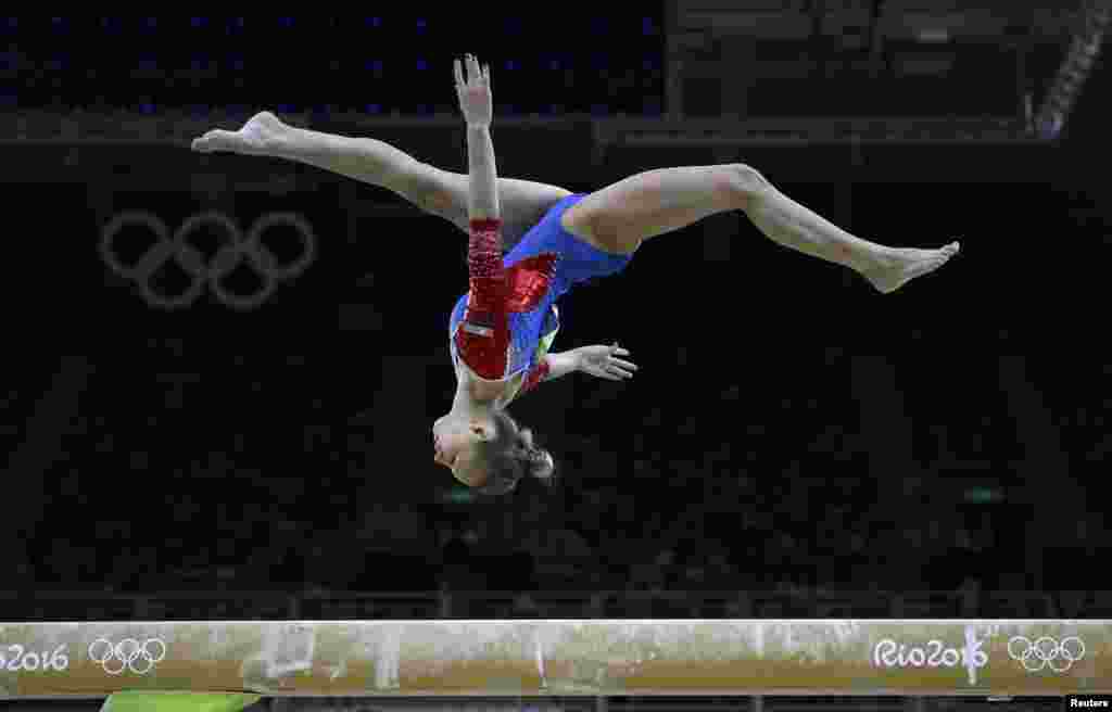 Daria Spiridonova of Russia competes on the balance beam during the women's qualifications.