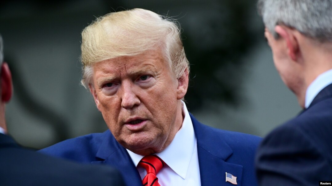 FILE - President Donald Trump speaks as he meets with sheriffs from across the country on the South Lawn of the White House in Washington, Sept. 26, 2019.