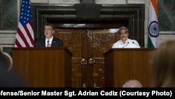 U.S. Secretary of Defense Ash Carter, left, speaks during a joint news conference with Indian Defense Minister Manohar Parrikar in New Dehli, India, April 12, 2016. 