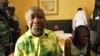 Gbagbo and wife Simone sit in a room at Hotel Golf after they were arrested, Abidjan, April 11, 2011.