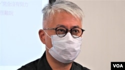 黃偉國表示，網上流傳的問卷並非香港民研的設計，部份題目完全是造假。(美國之音 湯惠芸)