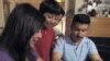 Latino-American family filling out census form