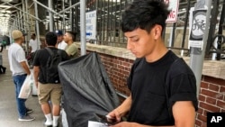 Nyu-York ko'chalaridagi migrantlar