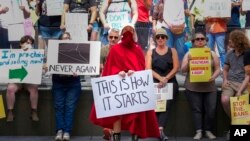 FILE - Abortion-rights activists rally at the Indiana Statehouse following the Supreme Court's decision to overturn Roe v. Wade on June 25, 2022 in Indianapolis. 