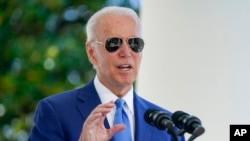 FILE - President Joe Biden speaks at the White House in Washington, Aug. 5, 2022.