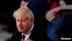 Perdana Menteri Inggris Boris Johnson menghadiri National Service of Thanksgiving yang diadakan di Katedral St Paul, selama perayaan Platinum Jubilee Ratu Elizabeth Inggris di London, 3 Juni 2022. (Foto: via Reuters)