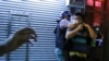  港警继续拘捕主要社运人士 港澳办不回应启用紧急法提问 