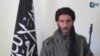 This image from video provided by the SITE Intel Group made available on January 17, 2013, purports to show militant militia leader Moktar Belmoktar. (AP has no way of independently verifying the content, location or date of this picture.)