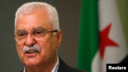 FILE - George Sabra, a veteran Christian opposition figure. His brother, Mahmoud, was arrested in Syria last week.