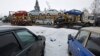 An autocart transports new cars on the road between Moscow and St.Petersburg, Feb. 6, 2013.
