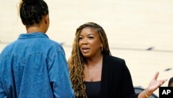 Cherelle Griner, Brittney Griner's wife, talks prior to a rally for Phoenix Mercury WNBA basketball player Griner on July 6, 2022, in Phoenix.