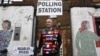 A man wearing a European themed cycling jersey leaves after voting at a polling station for the Referendum on the European Union in north London, Britain, June 23, 2016. 