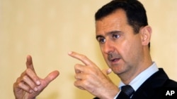 FILE - Syrian President Bashar al-Assad