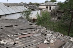 Houses, that locals said were damaged during a recent shelling by Azeri forces, are seen in the town of Martuni in the breakaway Nagorno-Karabakh region, Sept. 28, 2020. (Hayk Baghdasaryan/Photolure via Reuters)