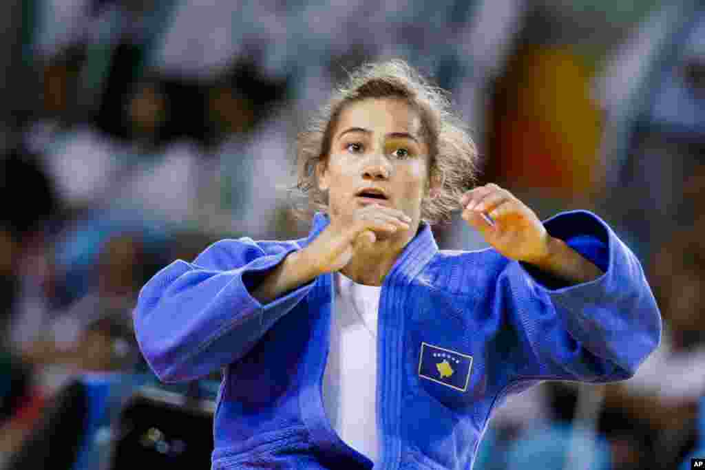 Kosovo's Majlinda Kelmendi reacts after winning the gold medal of the women's 52-kg judo competition at the 2016 Summer Olympics in Rio de Janeiro, Aug. 7, 2016.