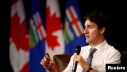 FILE - Canada's Prime Minister Justin Trudeau speaks at a meeting of the Calgary Chamber of Commerce in Calgary, Alberta, Dec. 21, 2016.