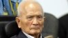 Nuon Chea, who was the Khmer Rouge's chief ideologist and No. 2 leader, waits before his final statements at the U.N.-backed war crimes tribunal in Phnom Penh, Cambodia, Thursday, Oct. 31, 2013.