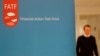 Logo dari Satuan Tugas Aksi Keuangan (FATF) terlihat saat berlangsungnya konferensi pers yang digelar di markas Organisasi Kerja Sama dan Ekonomi Pembangunan (OECD) di Paris, pada 18 Oktober 2019. (Foto: Reuters/Charles Platiau)