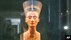 FILE - A bust of ancient Egyptian Queen Nefertiti at the New Museum in Berlin, Sept. 10, 2014.
