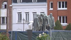 A Rodin sculpture of the burghers of Calais, who offered themselves as hostages to England in the 14th century in exchange for the lifting a siege on the city. (L. Bryant/VOA)