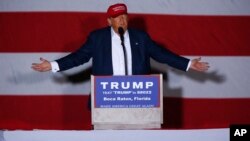 FILE - Republican presidential candidate Donald Trump speaks during a campaign rally in Boca Raton, Fla., Sunday, March 13, 2016.
